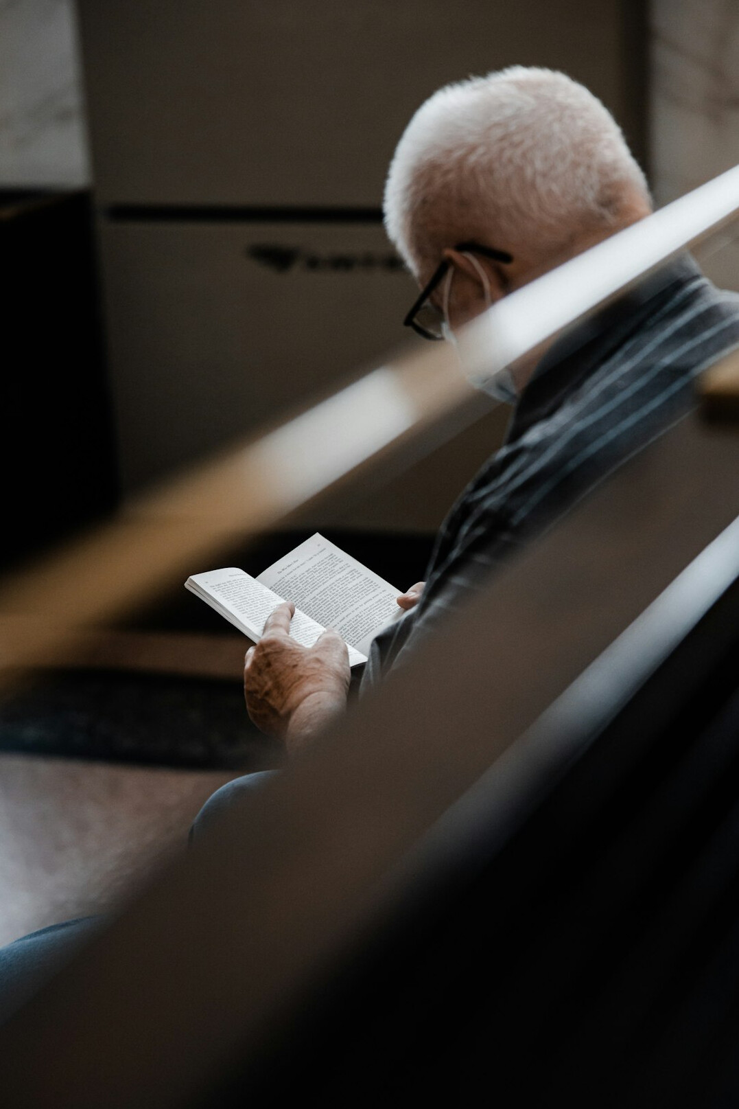 elderly person using tablet